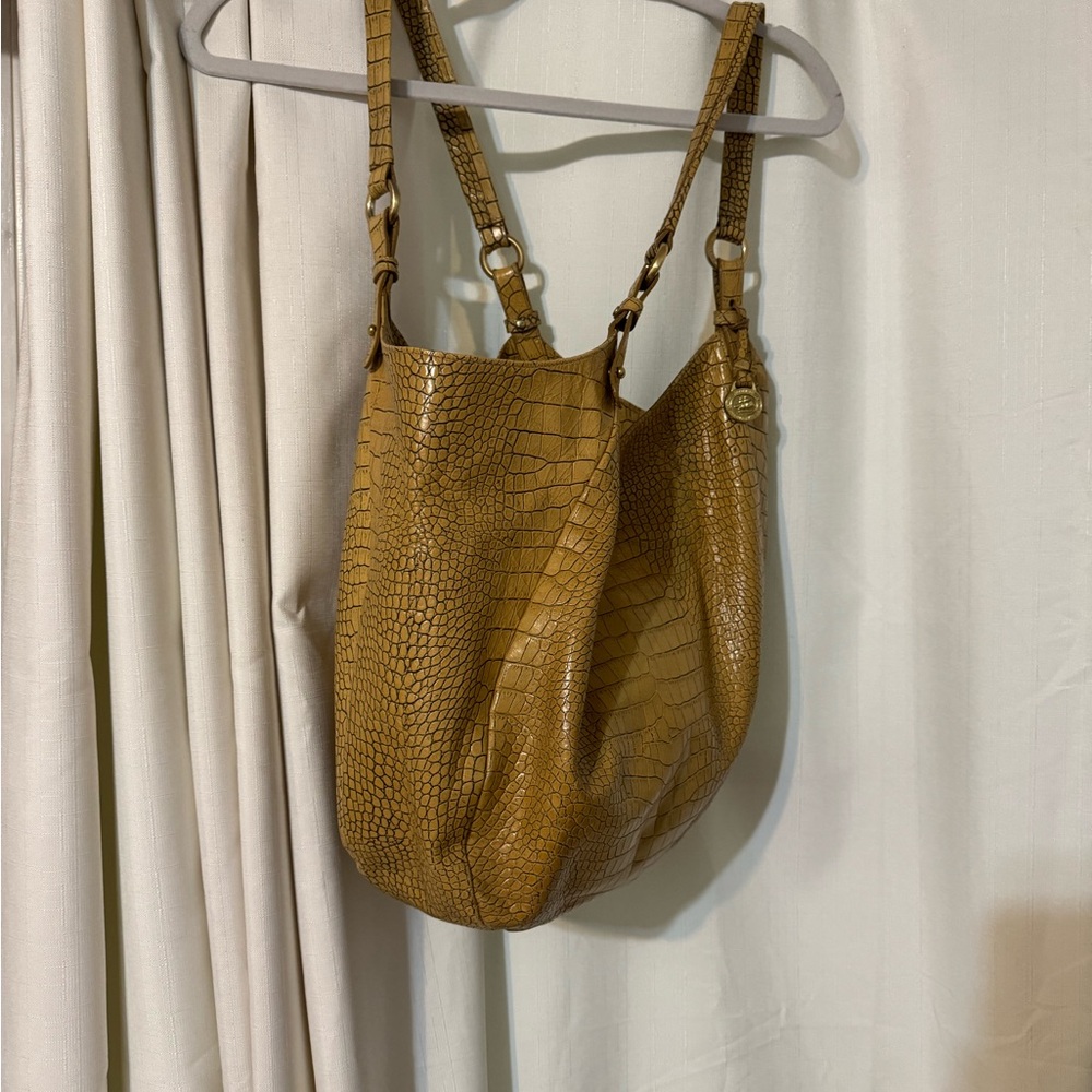 This is a very nice Brahmin bag.  Used but in great condition.